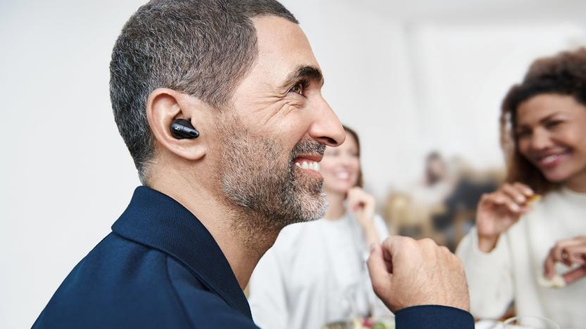 A man is pictured wearing Sennheiser's new earbud-style hearing aid.