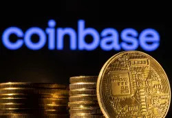 A representation of the cryptocurrency is seen in front of Coinbase logo in this illustration taken, March 4, 2022. REUTERS/Dado Ruvic/Illustration