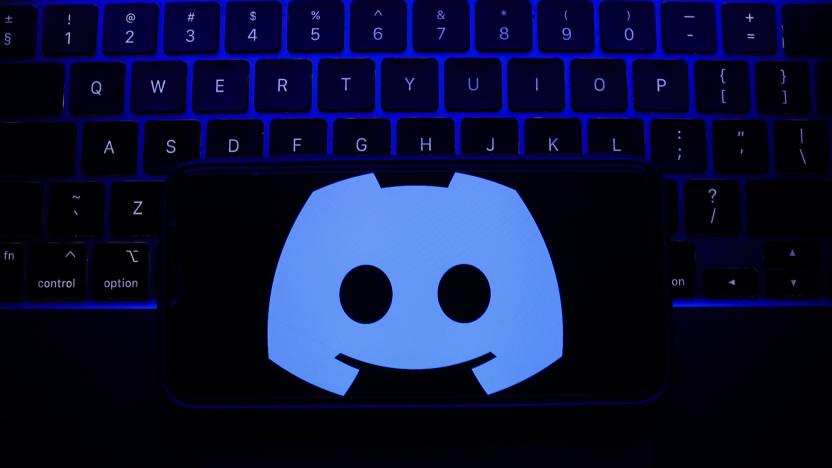 A laptop keyboard and Discord logo displayed on a phone screen are seen in this illustration photo taken in Krakow, Poland on May 7, 2023. (Photo by Jakub Porzycki/NurPhoto via Getty Images)