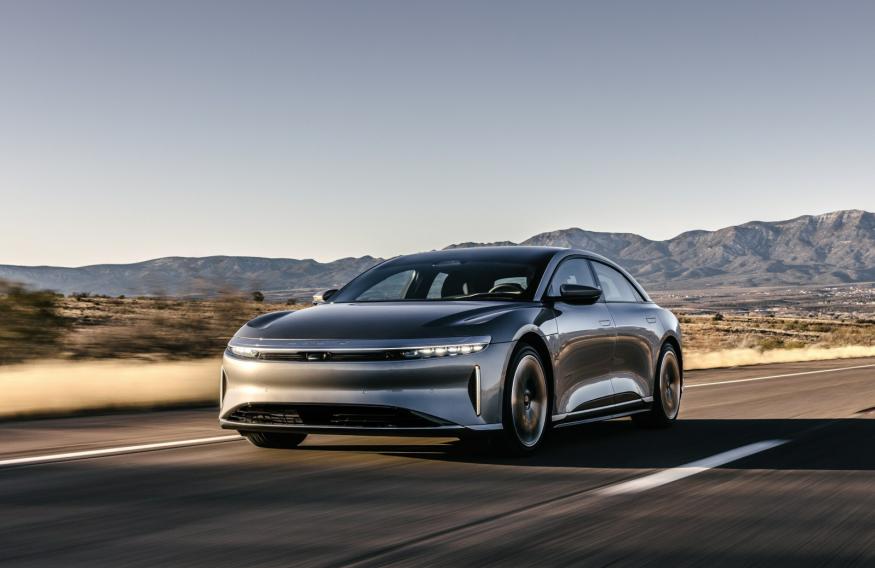 A computer render of Lucid Air Touring on the road.