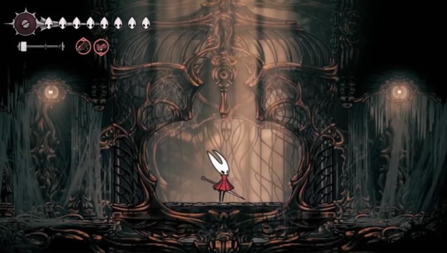 A screen grab from 'Hollow Knight: Silksong" showing main character Hornet. 