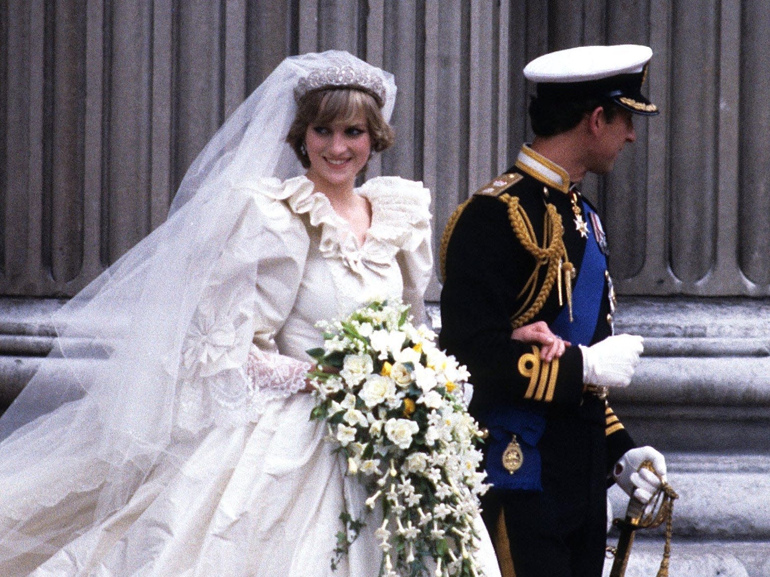 The designers of Princess Diana's iconic wedding dress are fighting ...