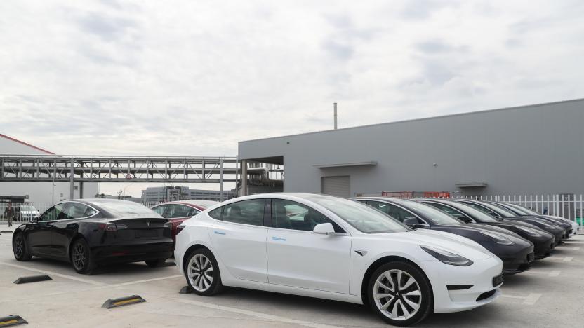 SHANGHAI, Oct. 26, 2020 -- Photo taken on Oct. 26, 2020 shows the Tesla China-made Model 3 vehicles at its gigafactory in Shanghai, east China. U.S. carmaker Tesla announced Monday that it will export 7,000 vehicles of made-in-China Model 3 to Europe on Tuesday.
    The batch of sedans is expected to arrive at the port of Zeebrugge in Belgium by sea at the end of November, before being sold in European countries including Germany, France, Italy, Spain, Portugal and Switzerland.
    Tesla delivered the first batch of made-in-China Model 3 sedans to the public earlier this year, one year after the company broke ground on its first overseas plant. (Photo by Ding Ting/Xinhua via Getty) (Xinhua/Ding Ting via Getty Images)