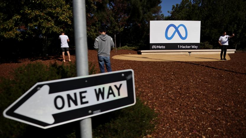 A man takes a selfie in front of a sign of Meta, the new name for the company formerly known as Facebook, at its headquarters in Menlo Park, California, U.S. October 28, 2021. REUTERS/Carlos Barria