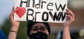 A demonstrator holds a sign for Andrew Brown Jr. during a protest march on April 22, 2021 in Elizabeth City, North Carolina. (Sean Rayford/Getty Images)