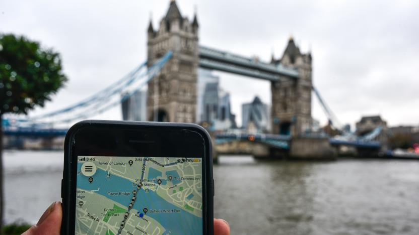 LONDON, ENGLAND - NOVEMBER 25: In this photo illustration the Uber logo is displayed on a phone in front of Tower Bridge on November 25, 2019 in London, England. Transport for London announced today, Monday, that Uber's license won't be renewed after it expires at the end of this month, November. Uber announced that they will appeal the decision. (Photo by Peter Summers/Getty Images)