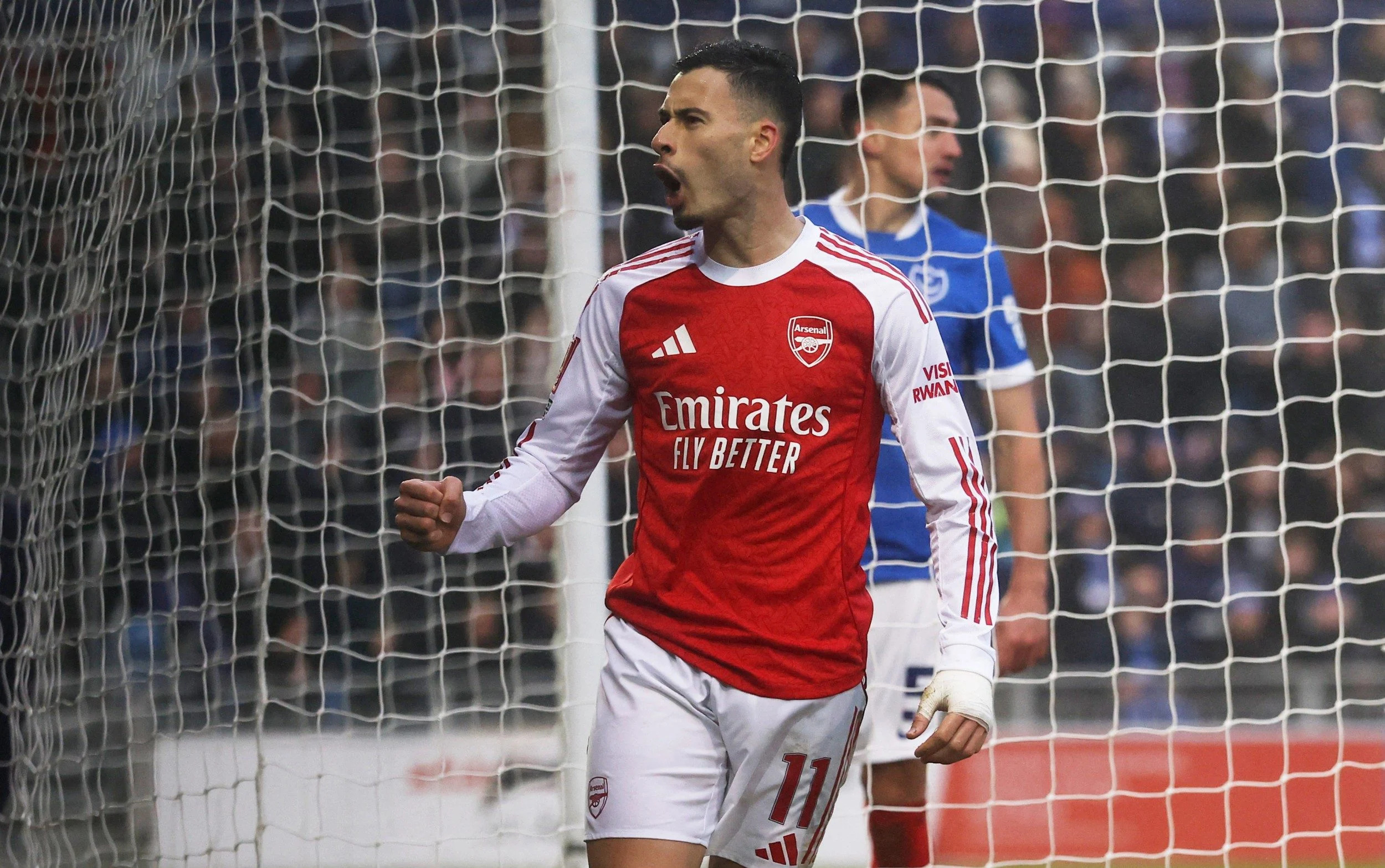 Arsenal fans taunt Gary Neville as hat-trick hero Martinelli answers his critics