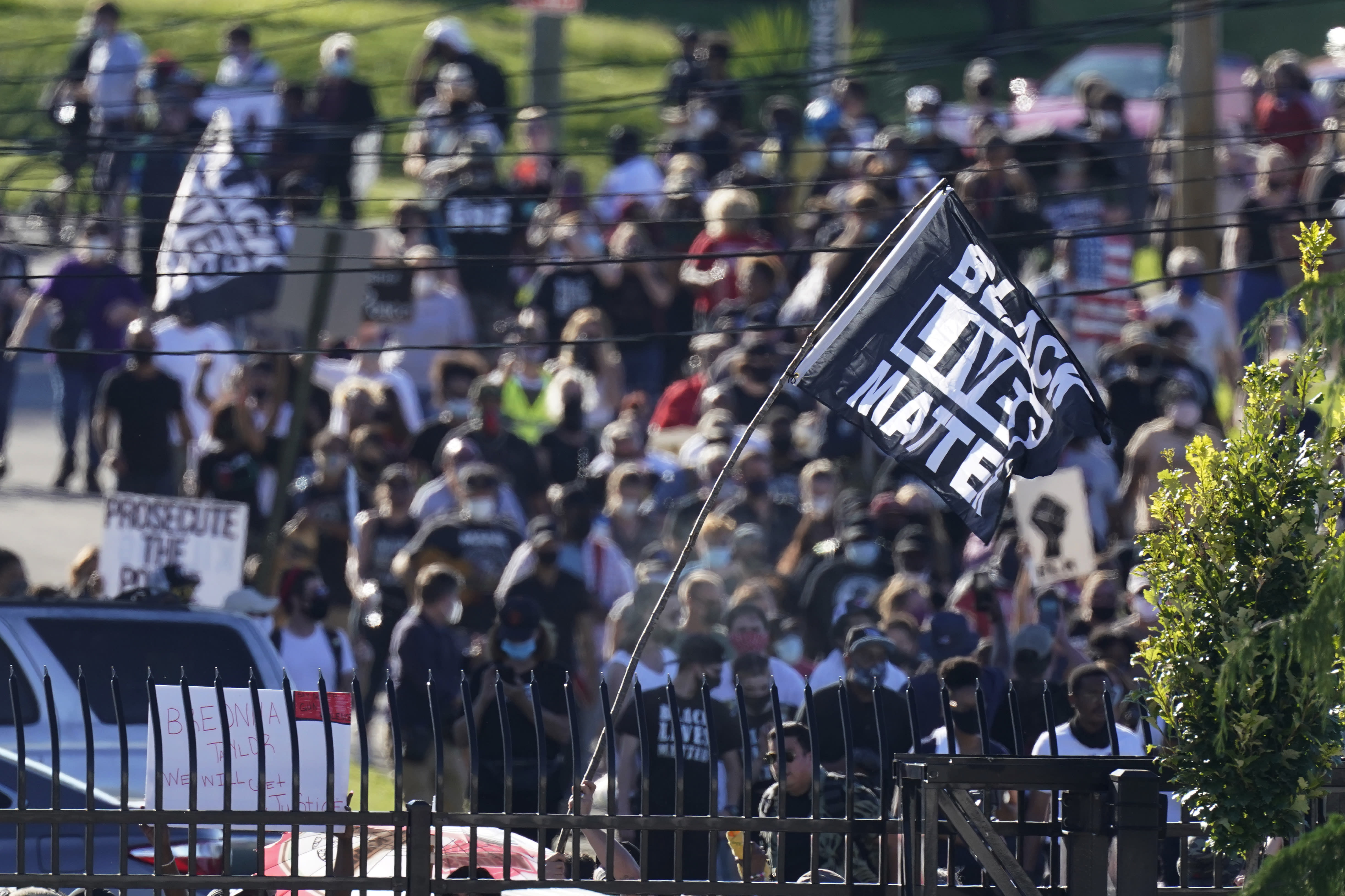 Thousands peacefully protest outside the Kentucky Derby