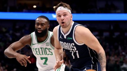 Getty Images - DALLAS, TEXAS - JANUARY 22: Luka Doncic #77 of the Dallas Mavericks goes to the basket against Jaylen Brown #7 of the Boston Celtics in the first half at American Airlines Center on January 22, 2024 in Dallas, Texas. NOTE TO USER: User expressly acknowledges and agrees that, by downloading and or using this photograph, User is consenting to the terms and conditions of the Getty Images License Agreement. (Photo by Tim Heitman/Getty Images)