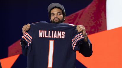 Getty Images - DETROIT, MI - APRIL 25: USC Quarterback Caleb Williams poses with his jersey after being taken first overall by the Chicago Bears during day 1 of the NFL Draft on April 25, 2024 at Fox Theatre in Detroit, MI. (Photo by John Smolek/Icon Sportswire via Getty Images)