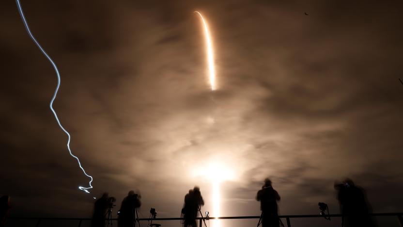 A long exposure shows a SpaceX Falcon 9 rocket, with the Crew Dragon capsule, as it is launched carrying three NASA and one ESA astronauts on a mission to the International Space Station at the Kennedy Space Center in Cape Canaveral, Florida, U.S. November 10, 2021. REUTERS/Thom Baur     TPX IMAGES OF THE DAY