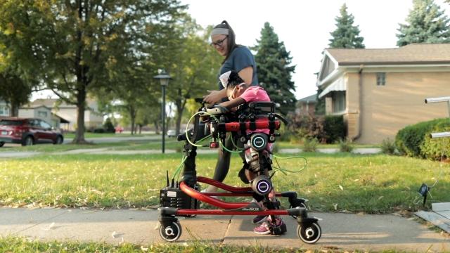 A robot that helps children in need of assistance walk