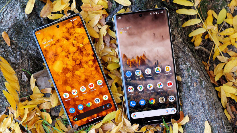 The Pixel 7 and Pixel 7 Pro laying face up on top of some branches and leaves. In the bottom row of icons on the Pixel 7 Pro, the second image from right shows a mask from the movie Friday the 13th.