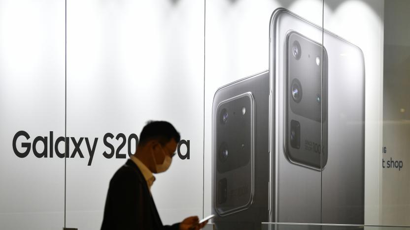 A man walks past an advertisement for the Samsung Galaxy S20 Ultra smartphone at a showroom in Seoul on July 30, 2020. - Samsung Electronics reported on July 30 its net profit grew 7.3 percent year-on-year in the second quarter, with strong demand for memory chips overcoming the impact of the coronavirus pandemic on smartphone sales. (Photo by Jung Yeon-je / AFP) (Photo by JUNG YEON-JE/AFP via Getty Images)