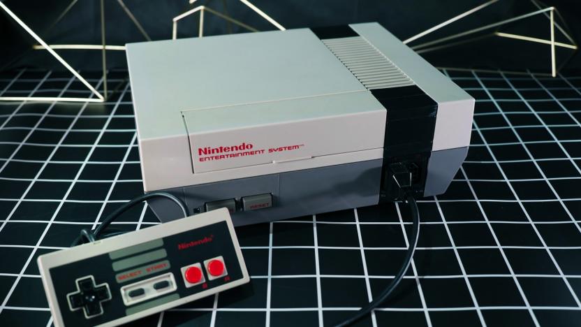 A Nintendo NES console pictured with a controller.