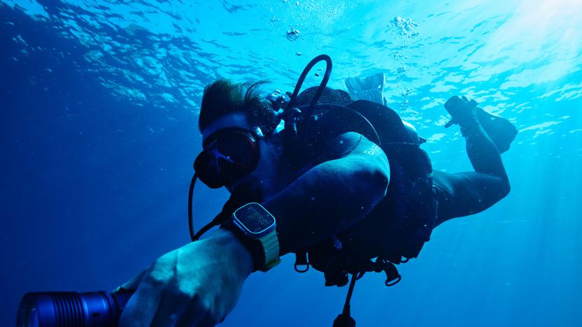 Oceanic+ app on scuba diver using Apple Watch Ultra 