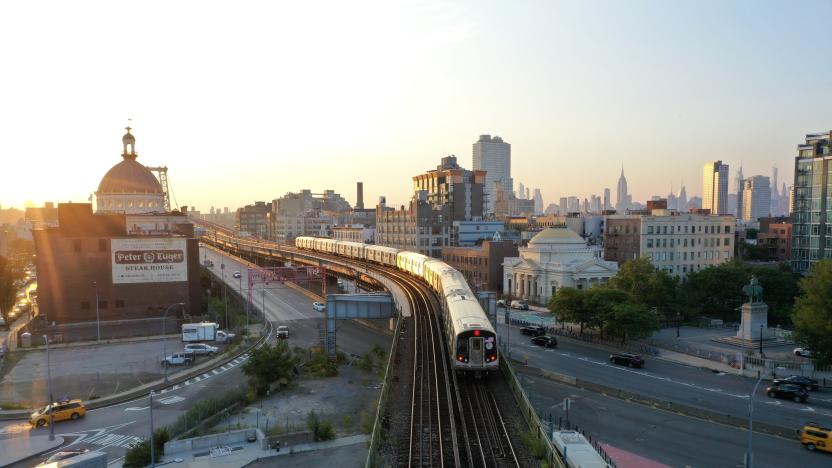 NEW YORK, USA - AUGUST 11: Subway trains run over the Williamsburg Bridge as the sun sets on August 11, 2020 in New York City, United States. (Photo by Lokman Vural Elibol/Anadolu Agency via Getty Images)