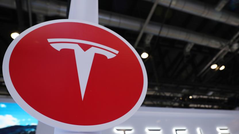 BEIJING, CHINA - AUGUST 29: A Tesla logo is displayed at Tesla booth ahead of the 2022 China International Fair for Trade in Services (CIFTIS) at China National Convention Center on August 29, 2022 in Beijing, China. The 2022 CIFTIS is slated to be held in Beijing from August 31 to September 5 to provide platforms for exchanges in service trade. (Photo by VCG/VCG via Getty Images)