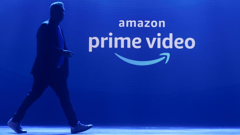 A man walks past a logo of Amazon Prime Video during a launch event in Mumbai, India, April 28, 2022. REUTERS/Francis Mascarenhas