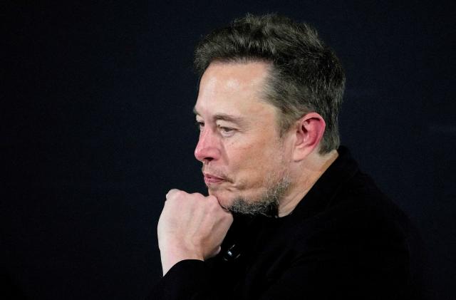 FILE PHOTO: Tesla and SpaceX's CEO Elon Musk pauses during an in-conversation event with British Prime Minister Rishi Sunak in London, Britain, Thursday, Nov. 2, 2023. 