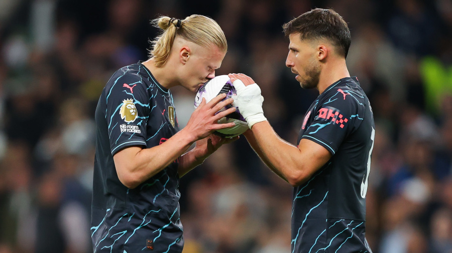 Getty Images - LONDON, ENGLAND - MAY 14: Erling Haaland of Manchester City kisses the matchball prior to scoring his side's second goal from the penalty spot during the Premier League match between Tottenham Hotspur and Manchester City at Tottenham Hotspur Stadium on May 14, 2024 in London, England. (Photo by James Gill - Danehouse/Getty Images)