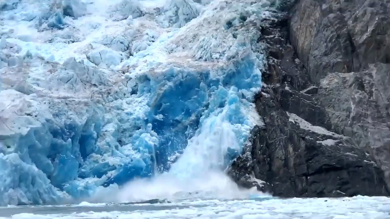 Footage Shows Moment Glacier Falls Into Ocean