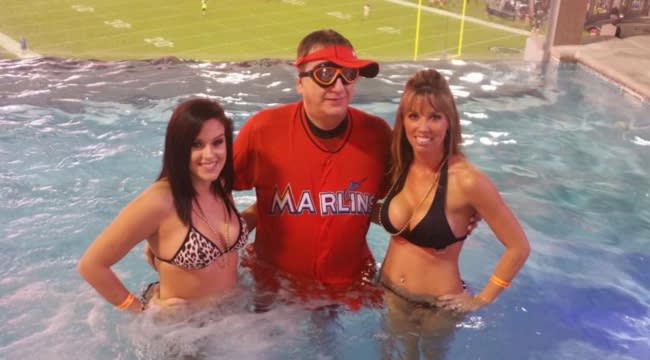 guy wearing marlins jersey at world series