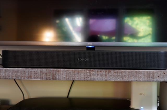 Sonos Beam (Gen 2) soundbar placed in front of a TV.