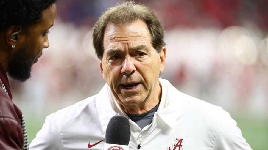 Getty Images - INDIANAPOLIS, IN - JANUARY 10: Head Coach Nick Saban of the Alabama Crimson Tide is interviewed during halftime of the College Football Playoff Championship game against the Georgia Bulldogs held at Lucas Oil Stadium on January 10, 2022 in Indianapolis, Indiana. (Photo by Jamie Schwaberow/Getty Images)