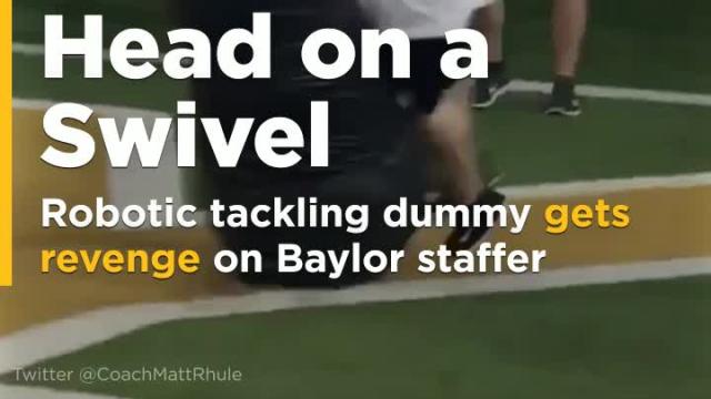 After losing to Baylor staffer in race, robotic tackling dummy gets revenge (Video)