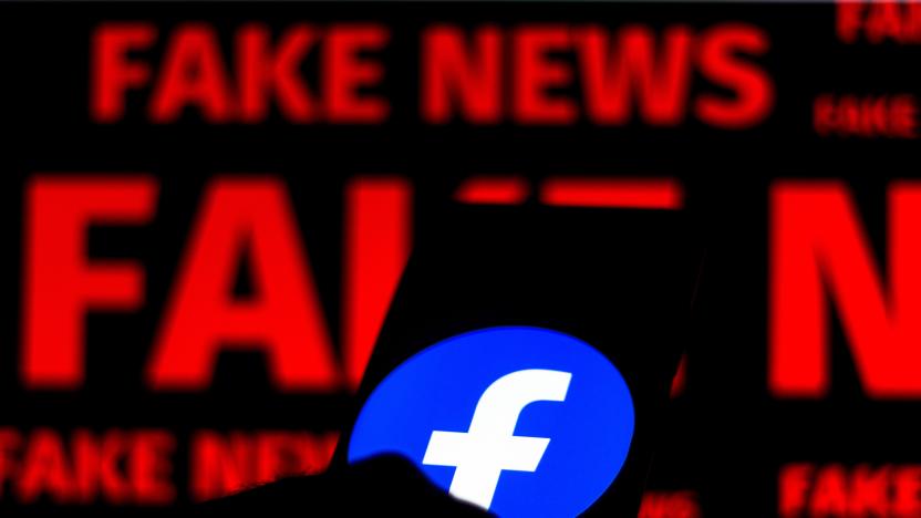 BRAZIL - 2020/06/15: In this photo illustration the Facebook logo is displayed on a smartphone and a red alerting word "FAKE NEWS" on the blurred background. (Photo Illustration by Rafael Henrique/SOPA Images/LightRocket via Getty Images)