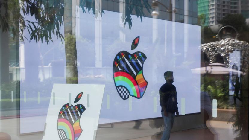 A man stands inside India's first Apple retail store during a media preview, a day ahead of its launch in Mumbai, India, April 17, 2023. REUTERS/Francis Mascarenhas