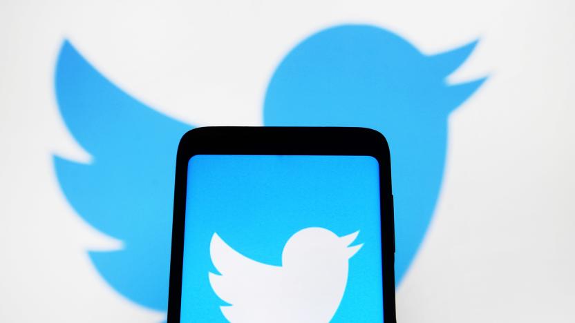 UKRAINE - 2021/01/11: In this photo illustration a Twitter logo is seen displayed on a smartphone and a computer screen in the background. (Photo Illustration by Pavlo Gonchar/SOPA Images/LightRocket via Getty Images)