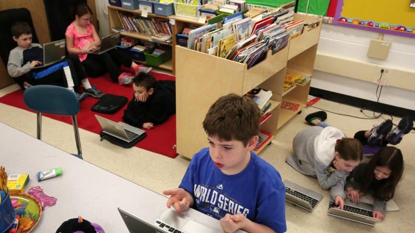 Seth Erdman, center, and his fellow students use Chromebooks while working on a lesson in a third grade class on Friday, Jan. 16, 2015, at Walden Elementary School in Deerfield, Ill. (Anthony Souffle/Chicago Tribune/TNS via Getty Images)