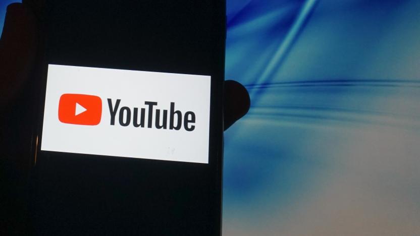 In this photo illustration a Youtube   logo is seen displayed on a smartphone in London 14 November 2020. (Photo illustration by Giannis Alexopoulos/NurPhoto via Getty Images)