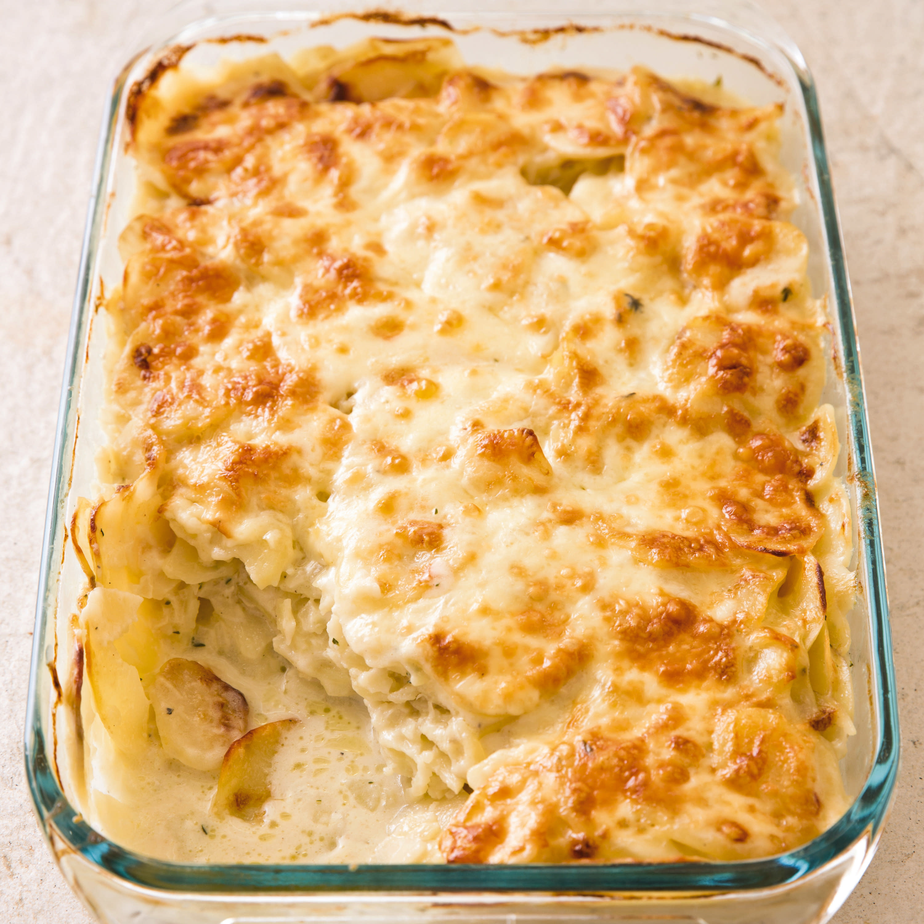 Our creamy scalloped potatoes has a browned, cheesy crust