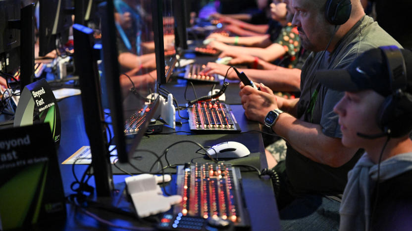 People play video games during Gamescom 2024, a computer and video game industry event, in Cologne, Germany August 22, 2024. REUTERS/Jana Rodenbusch