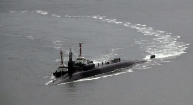 Tensions between the US and North Korea continue to rise as the US moved a missile-armed submarine to South Korea (xxx) 