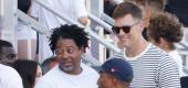 Tom Brady alongside Pharrell Williams at an MLS game. (Getty)