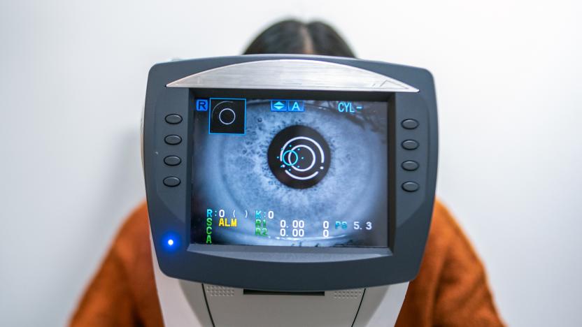 A Women having an eye exam at ophthalmologist's office.