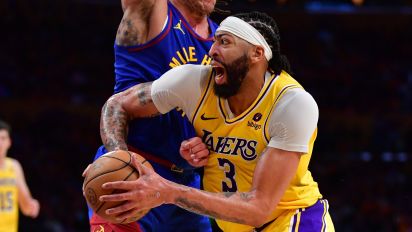 Reuters - Apr 25, 2024; Los Angeles, California, USA; Los Angeles Lakers forward Anthony Davis (3) moves the ball against Denver Nuggets forward Aaron Gordon (50) during the second half in game three of the first round for the 2024 NBA playoffs at Crypto.com Arena. Mandatory Credit: Gary A. Vasquez-USA TODAY Sports