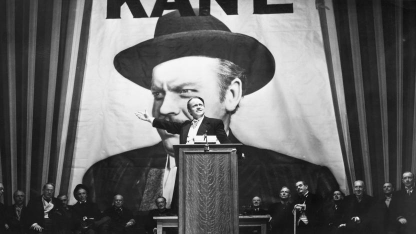 Charles Foster Kane (Orson Welles) makes a stirring campaign speech before a larger-than-life portrait of himself in a scene from Citizen Kane.