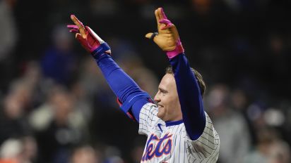 Associated Press - New York Mets' Brandon Nimmo (9) signals to fans after scoring a game-winning two-run home run during the ninth inning of a baseball game against the Atlanta Braves, Sunday, May 12, 2024, in New York. The Mets won 4-3. (AP Photo/Julia Nikhinson)