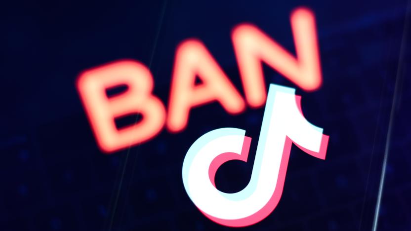 Ban sign displayed on a laptop screen and TikTok logo displayed on a phone screen are seen in this multiple exposure illustration photo taken in Krakow, Poland on March 27, 2023. (Photo by Jakub Porzycki/NurPhoto via Getty Images)