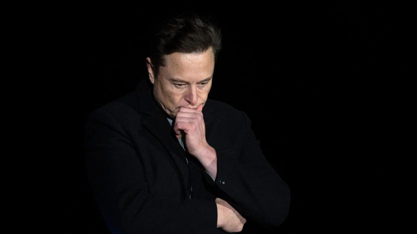 Elon Musk pauses and looks down as he speaks during a press conference at SpaceX's Starbase facility near Boca Chica Village in South Texas on February 10, 2022. - Billionaire entrepreneur Elon Musk delivered an eagerly-awaited update on SpaceX's Starship, a prototype rocket the company is developing for crewed interplanetary exploration. (Photo by JIM WATSON / AFP) (Photo by JIM WATSON/AFP via Getty Images)