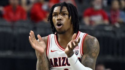 Getty Images - LAS VEGAS, NEVADA - MARCH 14: Caleb Love #2 of the Arizona Wildcats applauds his team in the first half of a quarterfinal game against the USC Trojans during the Pac-12 Conference basketball tournament at T-Mobile Arena on March 14, 2024 in Las Vegas, Nevada. The Wildcats defeated the Trojans 70-49. (Photo by David Becker/Getty Images)