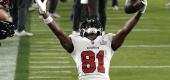 Tampa Bay Buccaneers wide receiver Antonio Brown celebrates after catching a 1-yard touchdown pass. (AP)