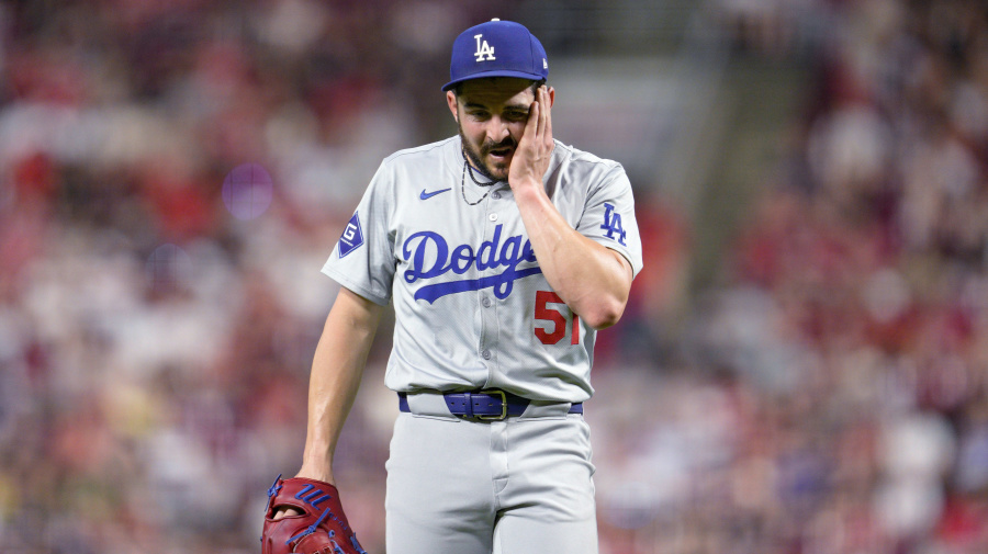 Associated Press - Los Angeles Dodgers pitcher Alex Vesia walks to the dugout during the sixth inning of the team's baseball game against the Cincinnati Reds on Friday, May 24, 2024, in Cincinnati. (AP Photo/Jeff Dean)