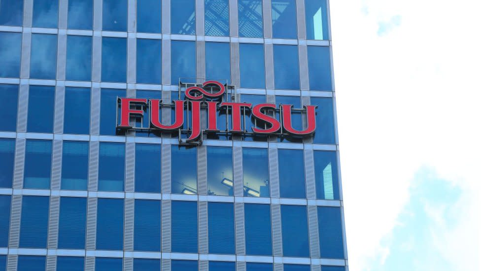 Technology firm Fujitsu has said it will halve its office space in Japan as it adapts to the 