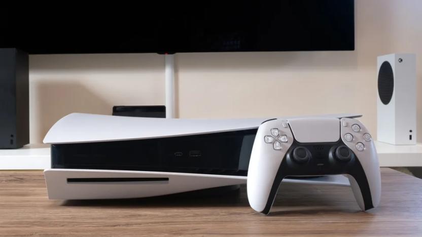 A white gaming console and controller on top of a table.